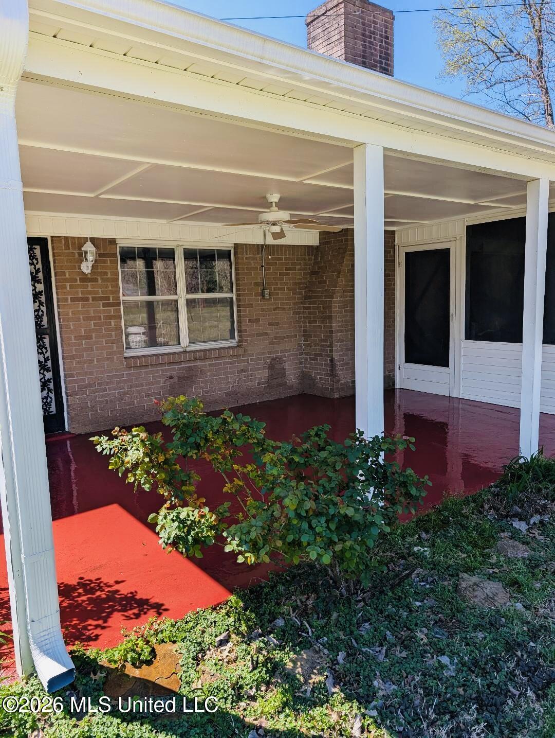 5656 Coleman Road Olive Branch, MS 38654 - Photo 11 of 42 Newly painted red, covered patio