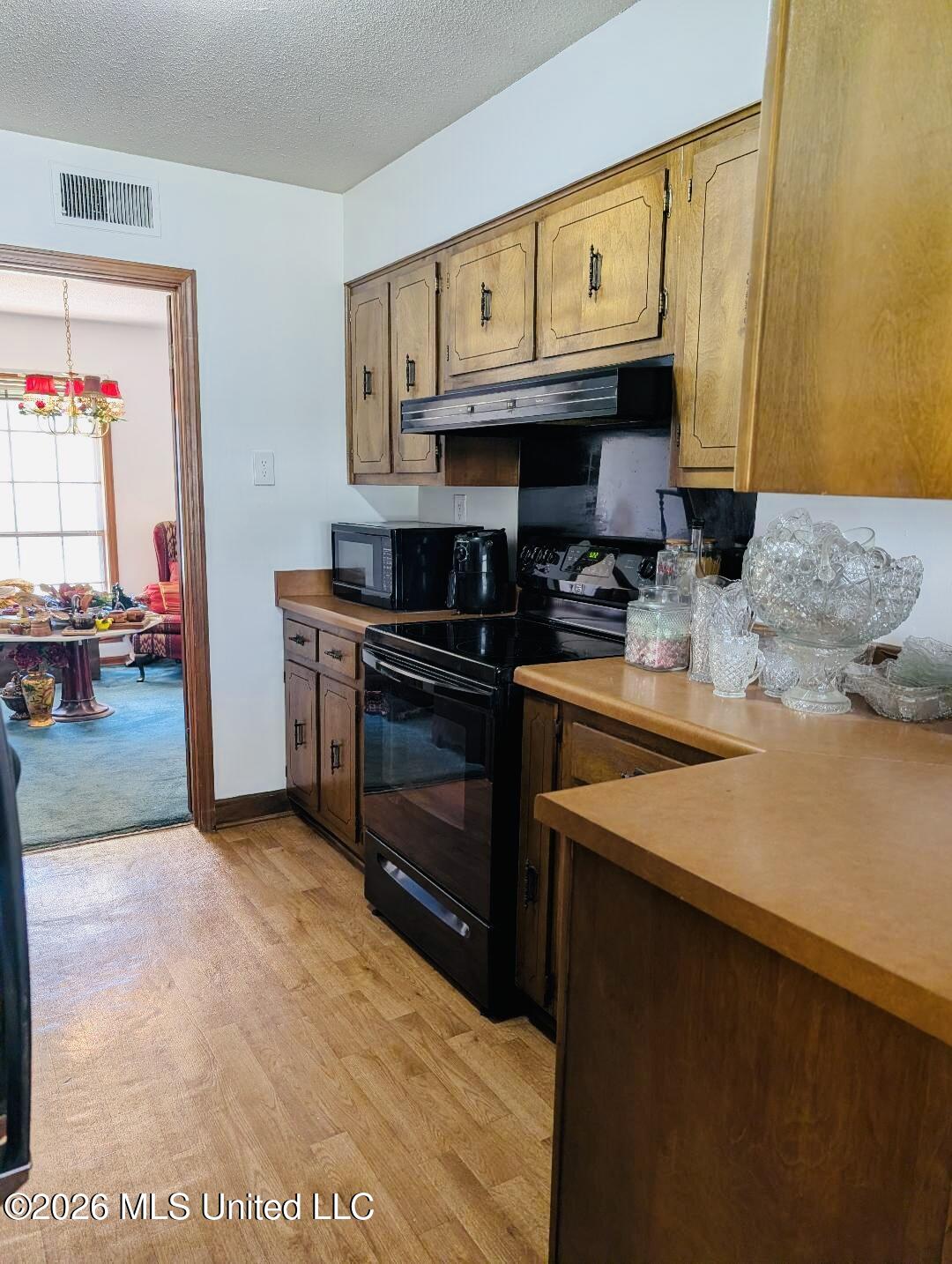 5656 Coleman Road Olive Branch, MS 38654 - Photo 21 of 42 From Kitchen into Dining Room