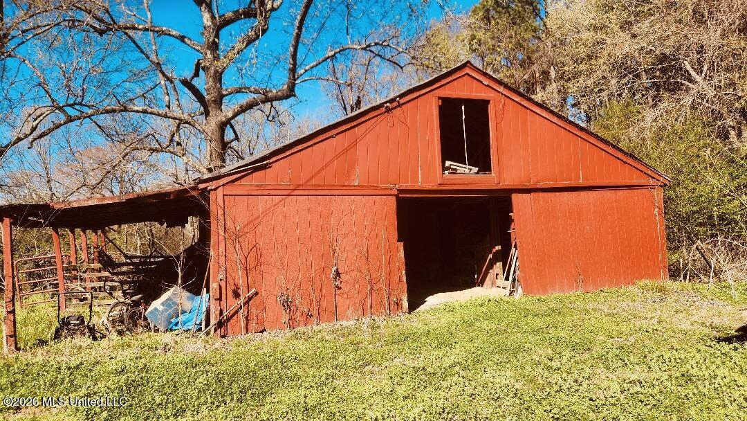 5656 Coleman Road Olive Branch, MS 38654 - Photo 7 of 42 Red Barn with 4 Horse Stalls