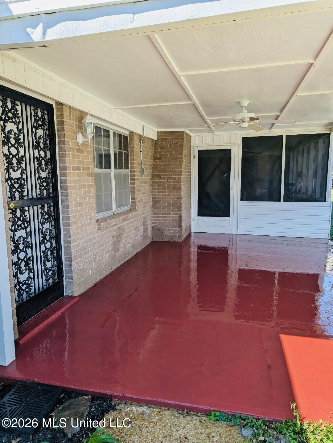5656 Coleman Road Olive Branch, MS 38654 - Photo 10 of 42 Back security door on red patio