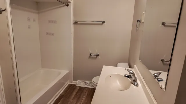 a bathroom with a sink and a tub