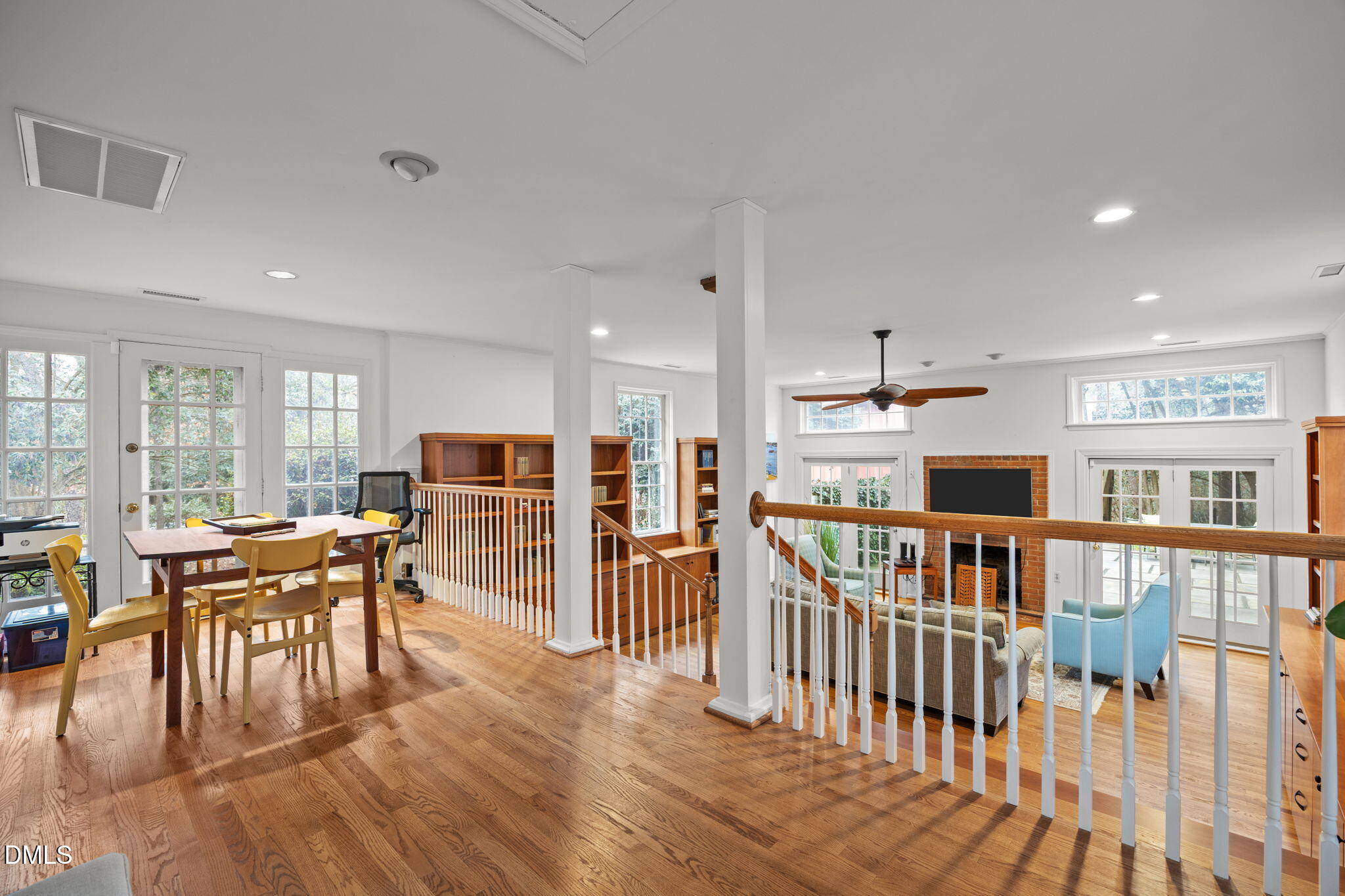 1121 Anderson Street Durham, NC 27705 - Photo 10 of 59 a living room with lots of furniture and a dining table with wooden floor
