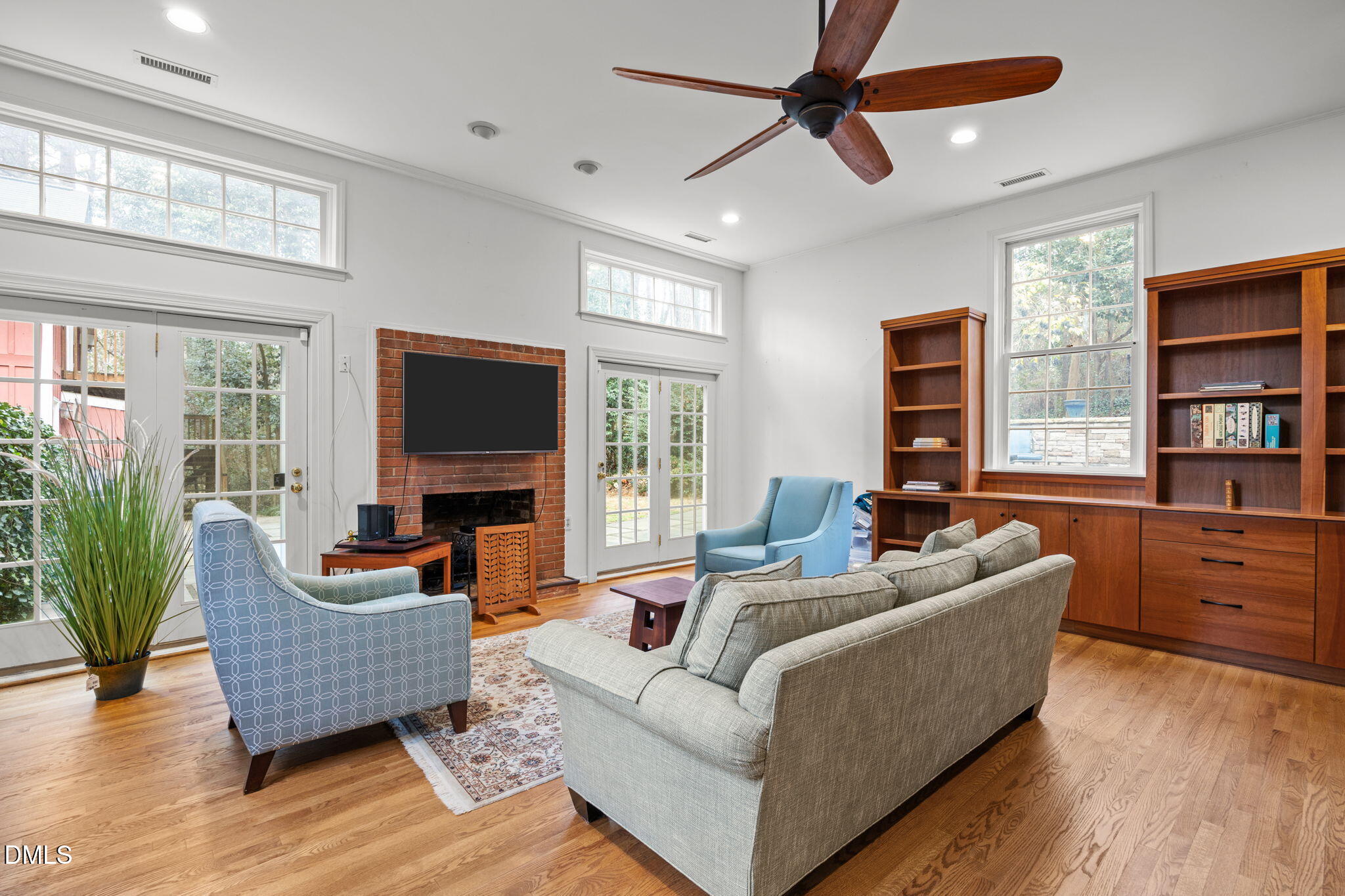 1121 Anderson Street Durham, NC 27705 - Photo 12 of 59 a living room with furniture and a flat screen tv