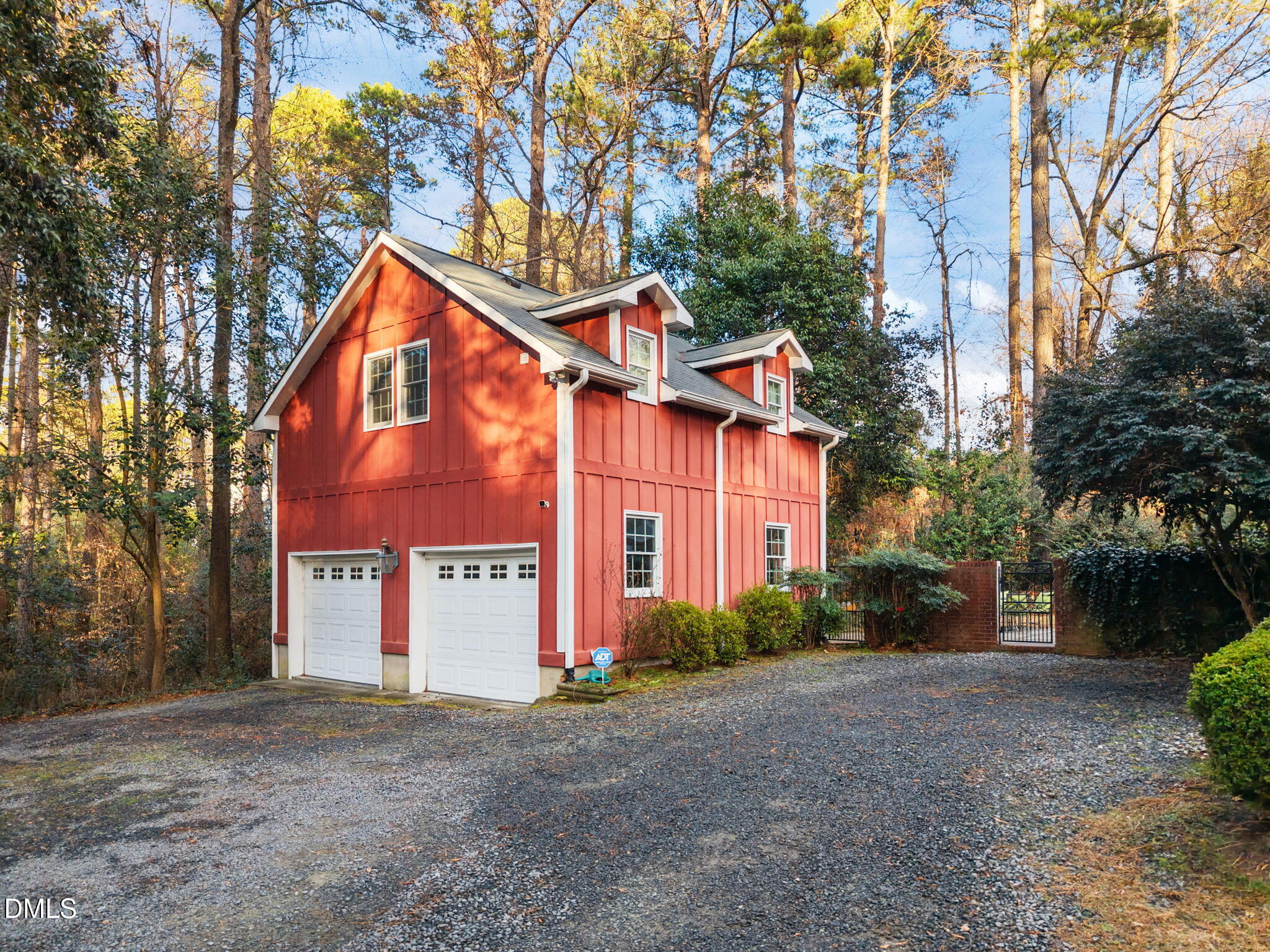 1121 Anderson Street Durham, NC 27705 - Photo 17 of 59 a view of a white house with a large tree