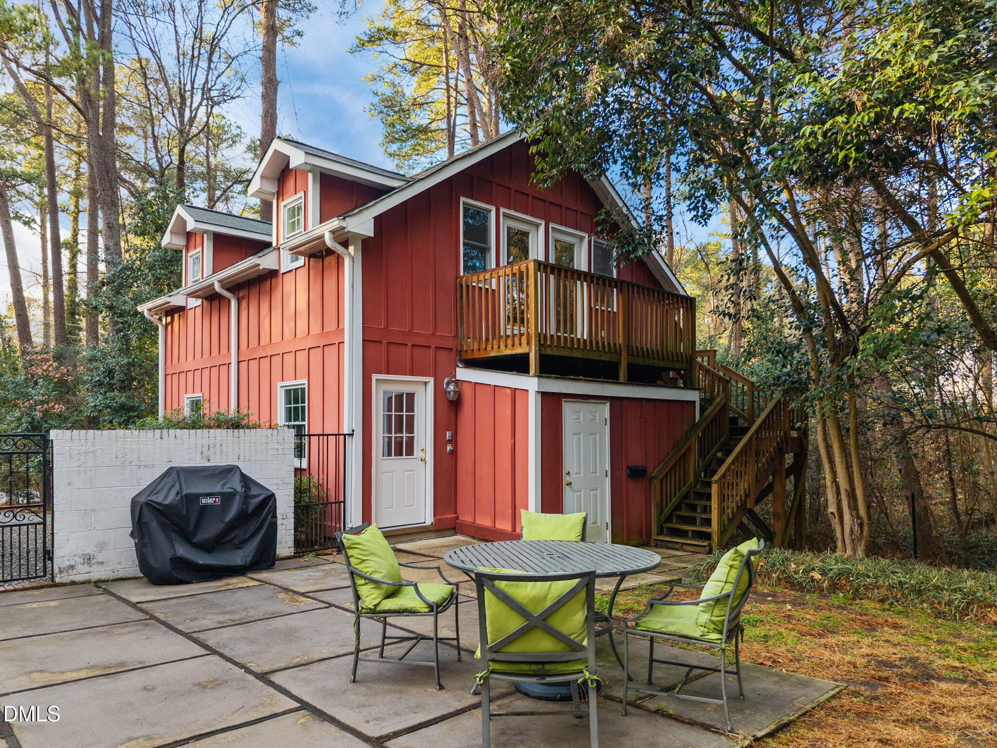 1121 Anderson Street Durham, NC 27705 - Photo 19 of 59 a view of a chair and table in the backyard of the house