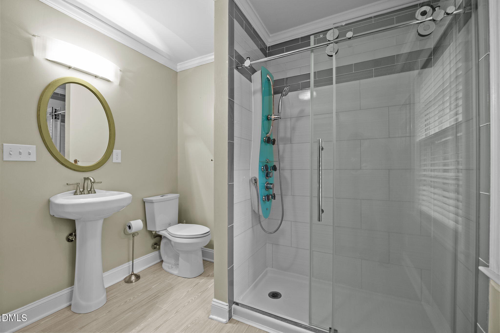 1121 Anderson Street Durham, NC 27705 - Photo 29 of 59 a bathroom with a sink toilet and shower