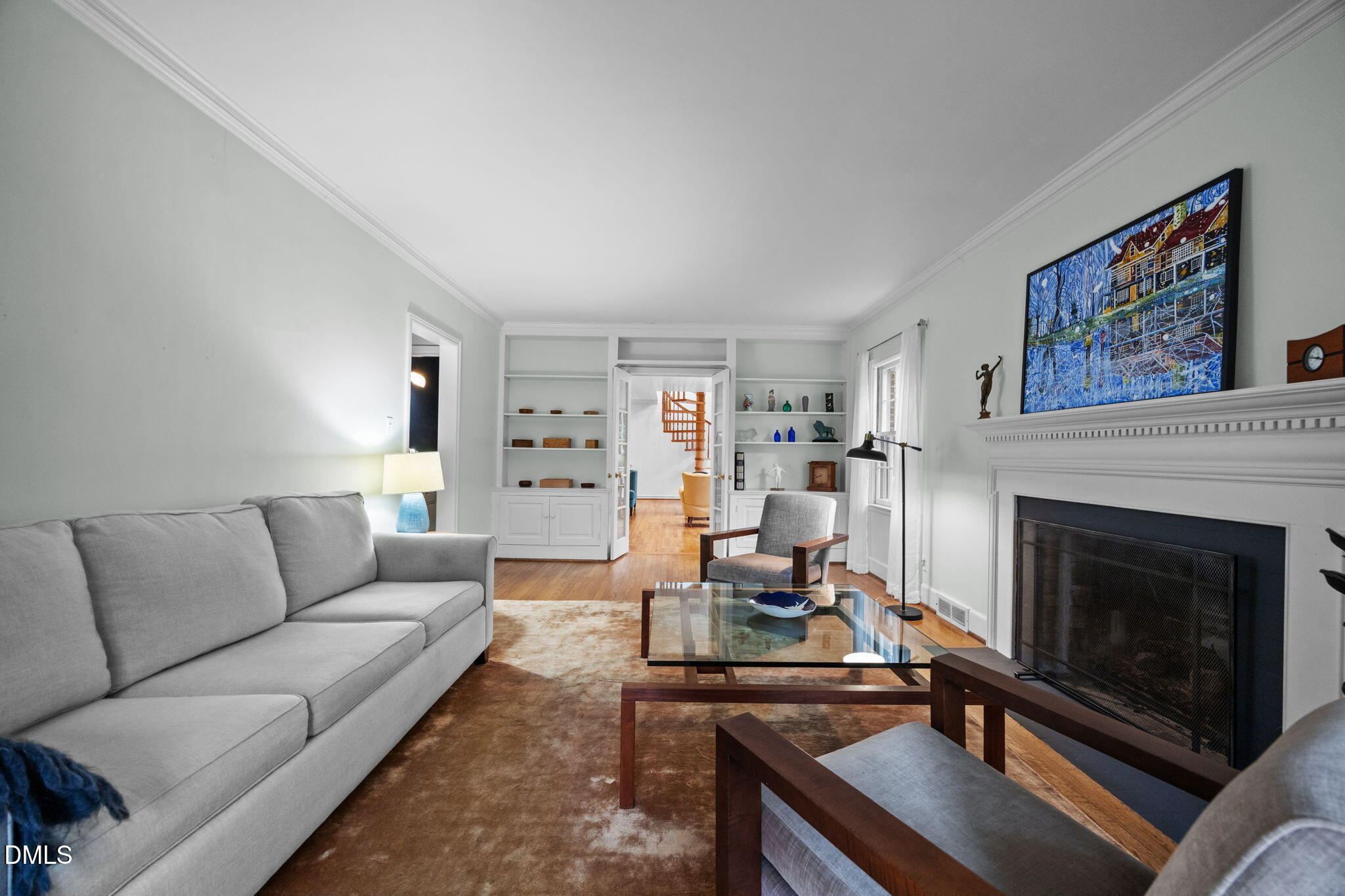 1121 Anderson Street Durham, NC 27705 - Photo 4 of 59 a living room with furniture and a fireplace