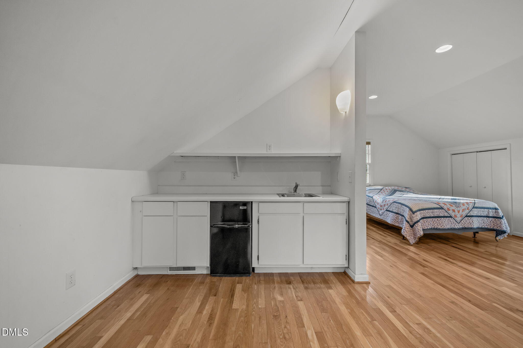 1121 Anderson Street Durham, NC 27705 - Photo 50 of 59 a room with a bed and a view of kitchen