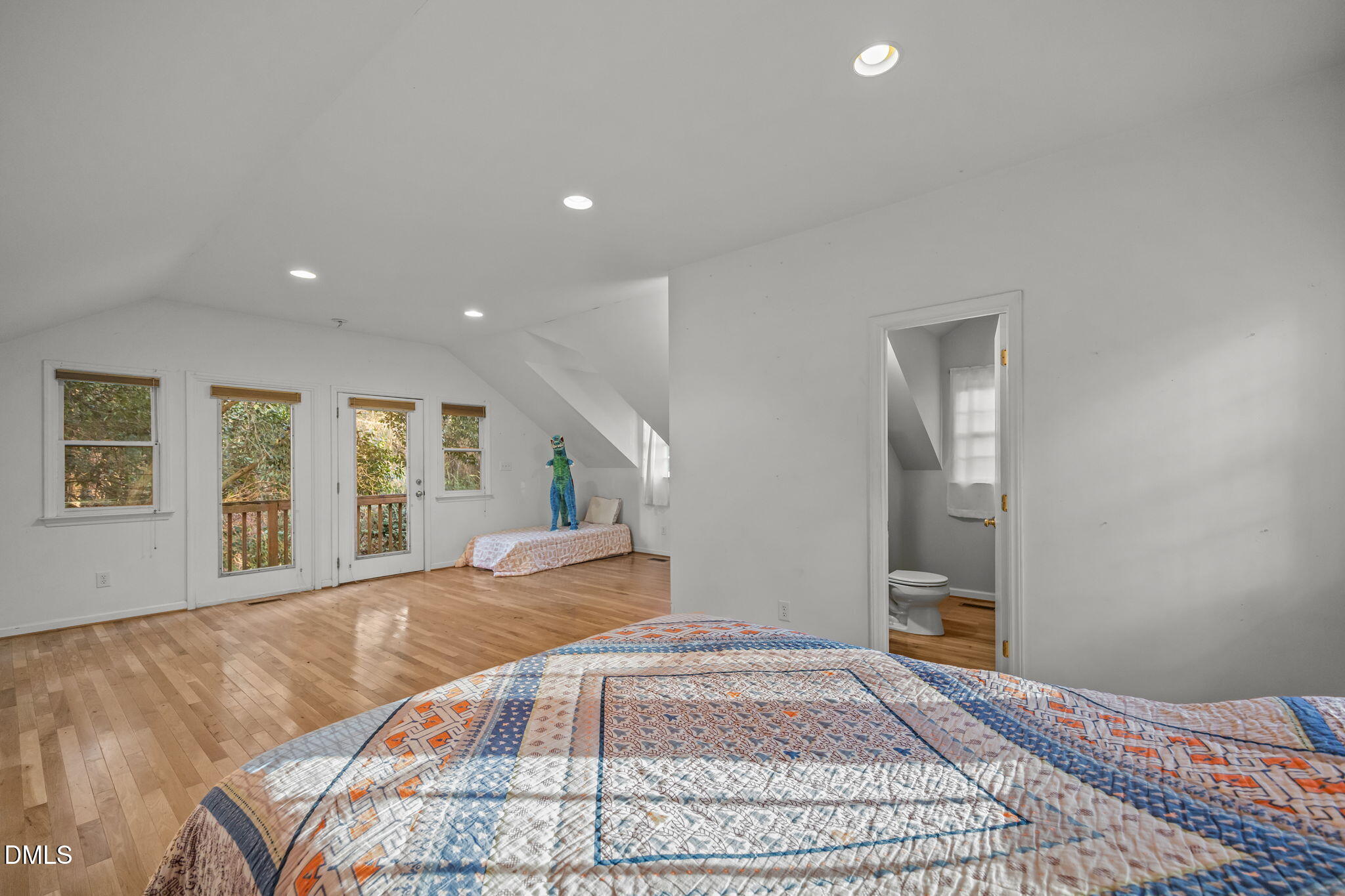 1121 Anderson Street Durham, NC 27705 - Photo 51 of 59 a view of a bedroom with furniture and windows
