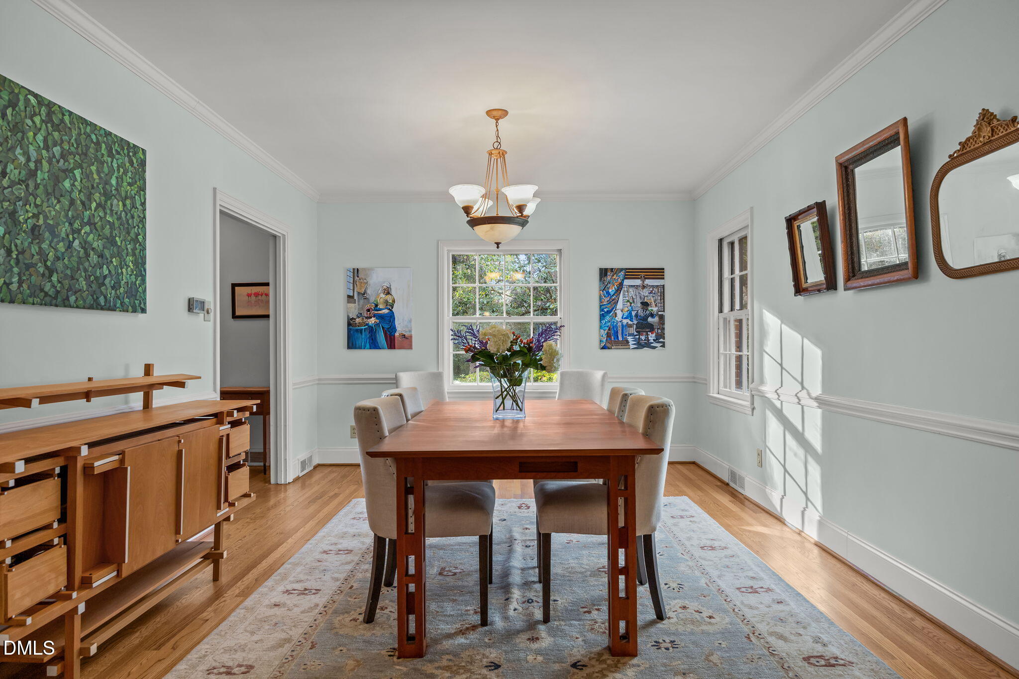 1121 Anderson Street Durham, NC 27705 - Photo 7 of 59 a view of a dining room with furniture window and wooden floor