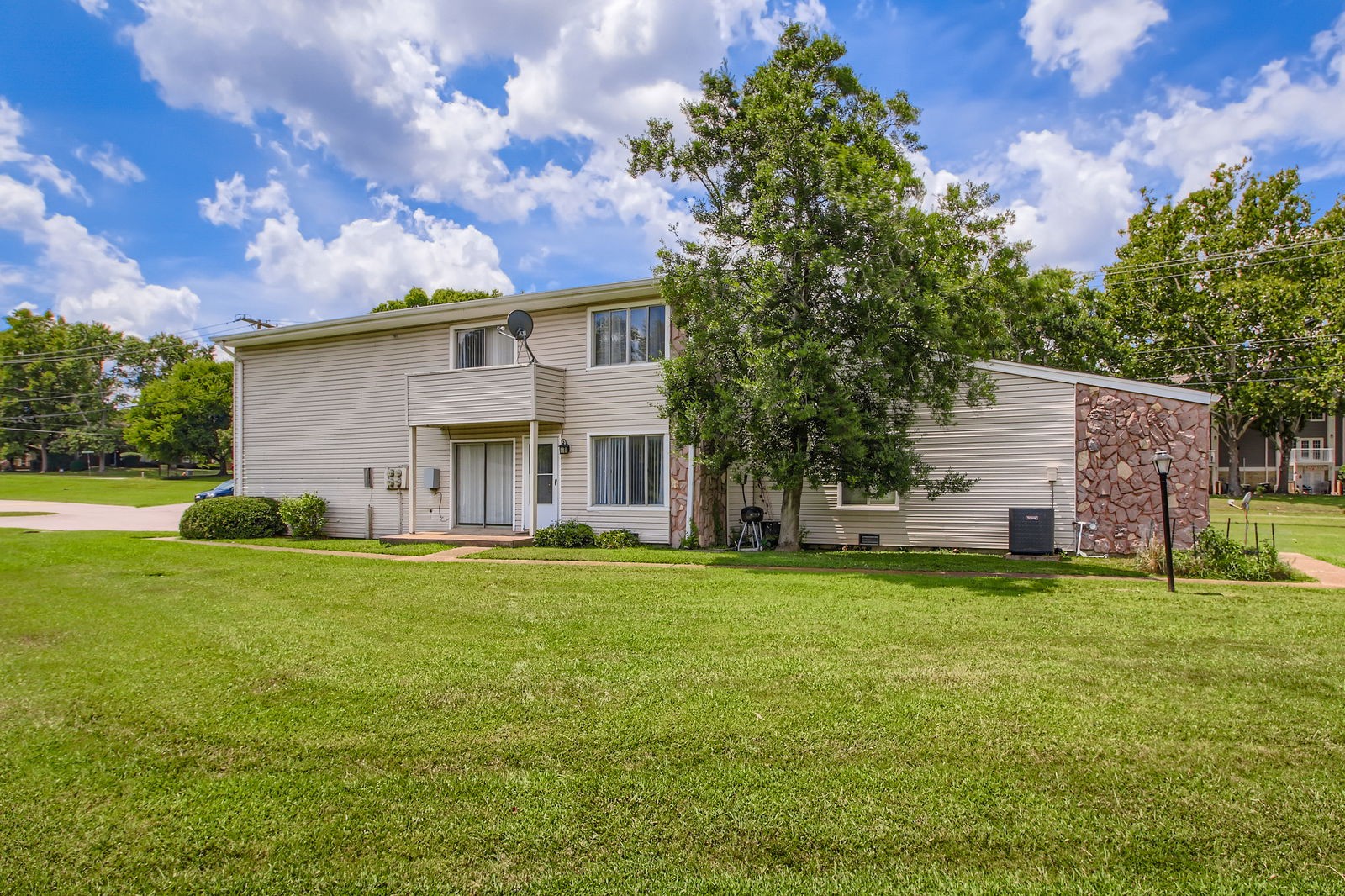 810 Bellevue Road, Unit 120 Nashville, TN 37221 - Photo 1 of 33 a front view of a house with a yard and garage