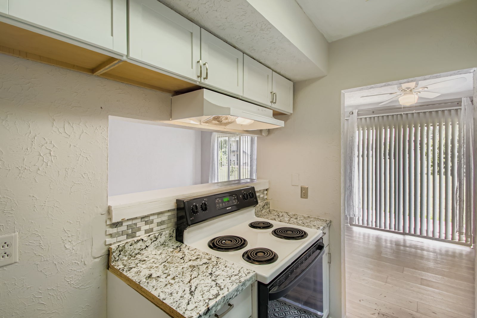 810 Bellevue Road, Unit 120 Nashville, TN 37221 - Photo 13 of 33 a view of kitchen island with furniture and wooden floor