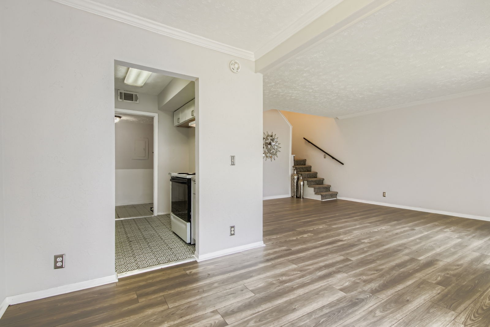 810 Bellevue Road, Unit 120 Nashville, TN 37221 - Photo 10 of 33 a view of a hallway view with wooden floor and staircase