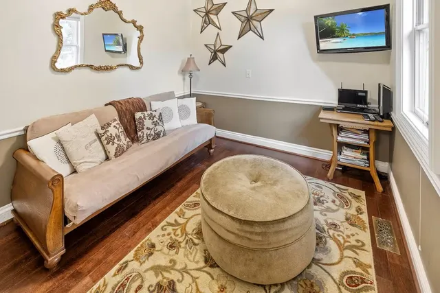 a living room with a couch and a table