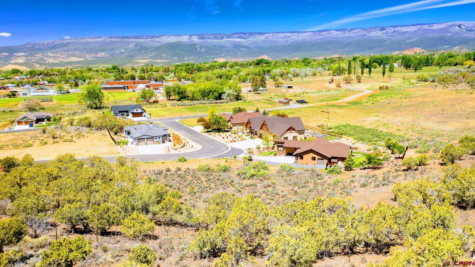 605-615 Southeast Pine Street Cedaredge, CO 81413 - Photo 13 of 18 a view of a city with an ocean