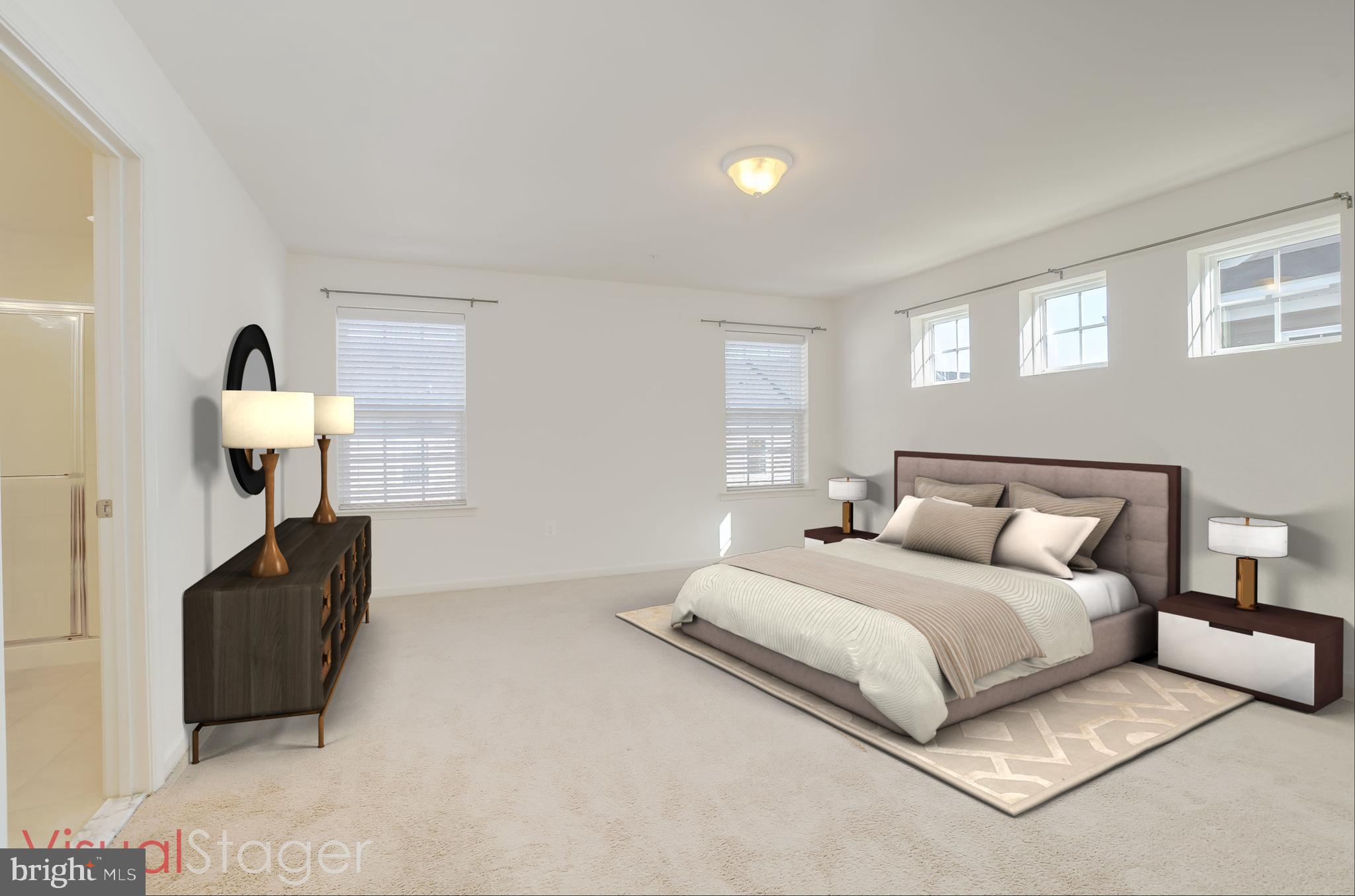 972 Winter Run Road Baltimore, MD 21220 - Photo 13 of 23 a bedroom with a bed and chair