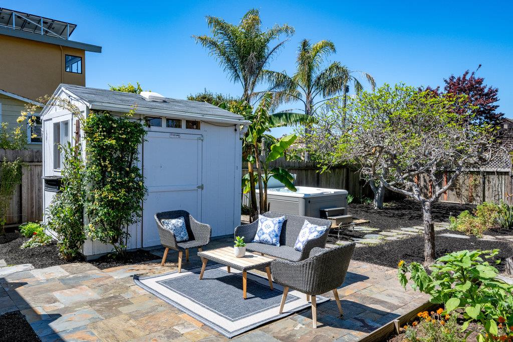 1220 Peralta Avenue Berkeley, CA 94706 - Photo 13 of 15 a view of backyard with outdoor seating and plants