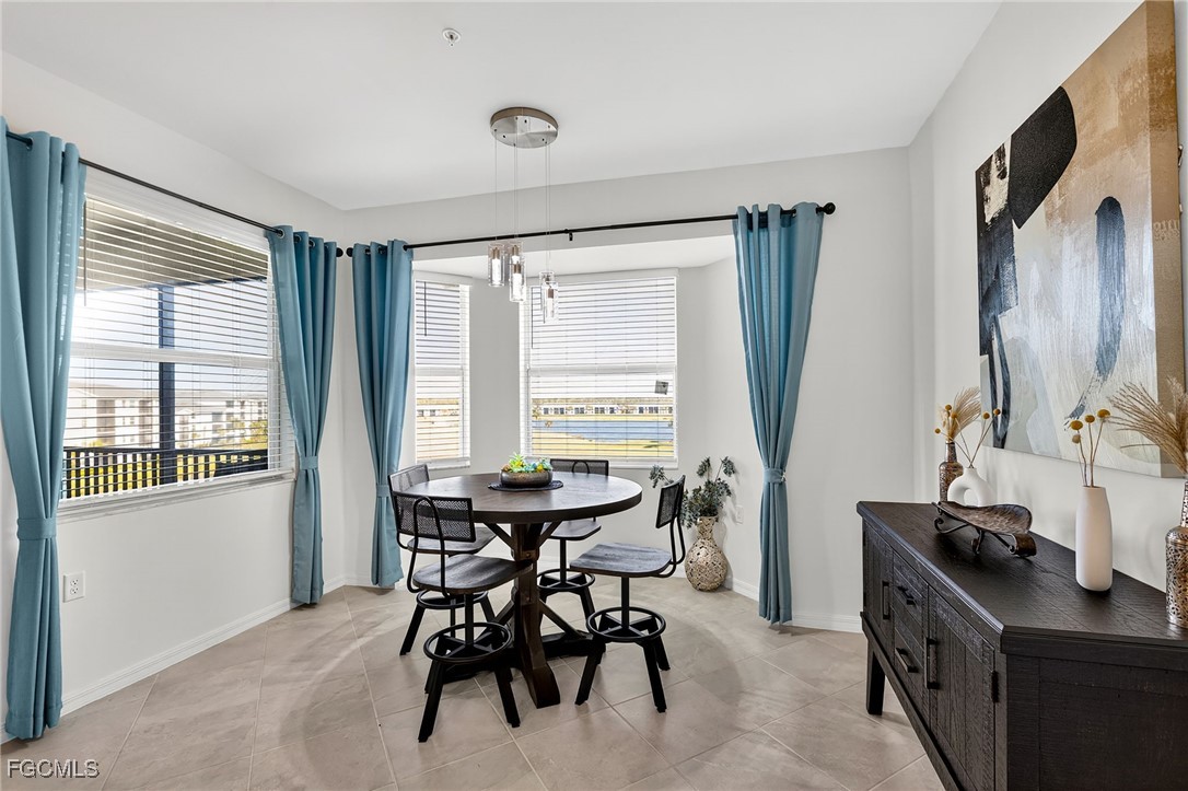 43997 Boardwalk Loop, Unit 1841 Punta Gorda, FL 33982 - Photo 17 of 43 a view of a workspace with furniture and a window