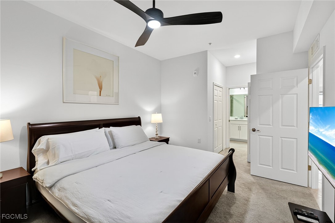 43997 Boardwalk Loop, Unit 1841 Punta Gorda, FL 33982 - Photo 24 of 43 a bedroom with a bed and a window