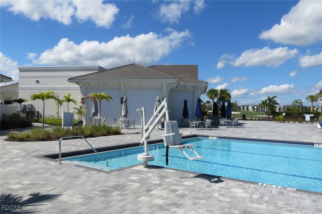 43997 Boardwalk Loop, Unit 1841 Punta Gorda, FL 33982 - Photo 39 of 43 a park view with a bench