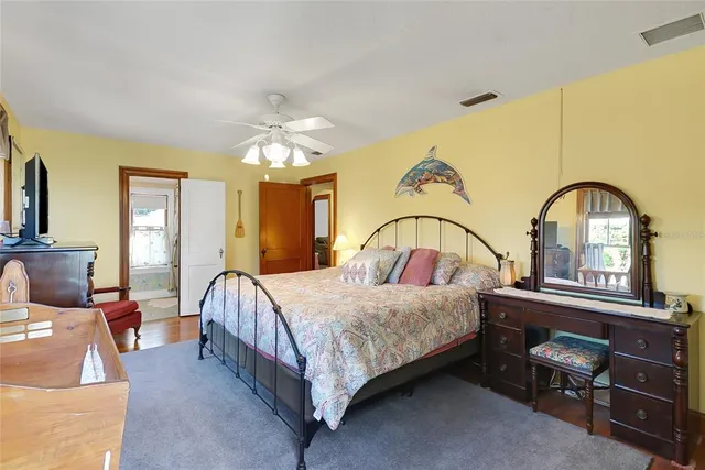 a bathroom with a sink a mirror and a shower