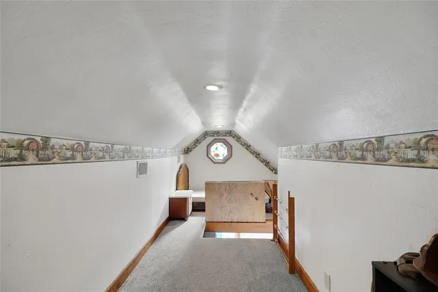 a view of a kitchen with sink stove and refrigerator