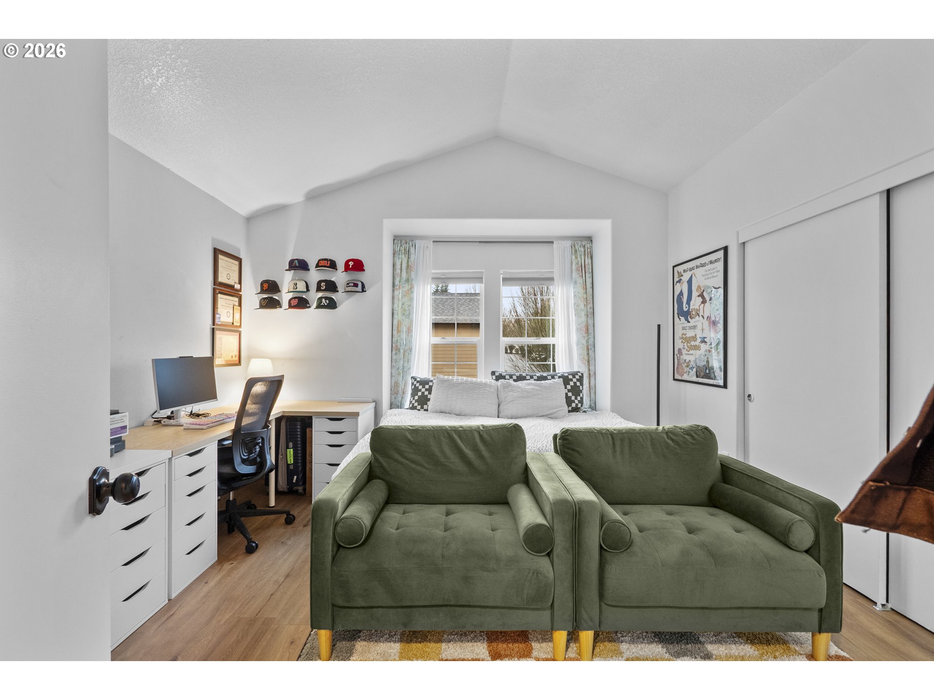 13949 Beavercreek Road, Unit 114 Oregon City, OR 97045 - Photo 12 of 27 a living room with furniture and a flat screen tv