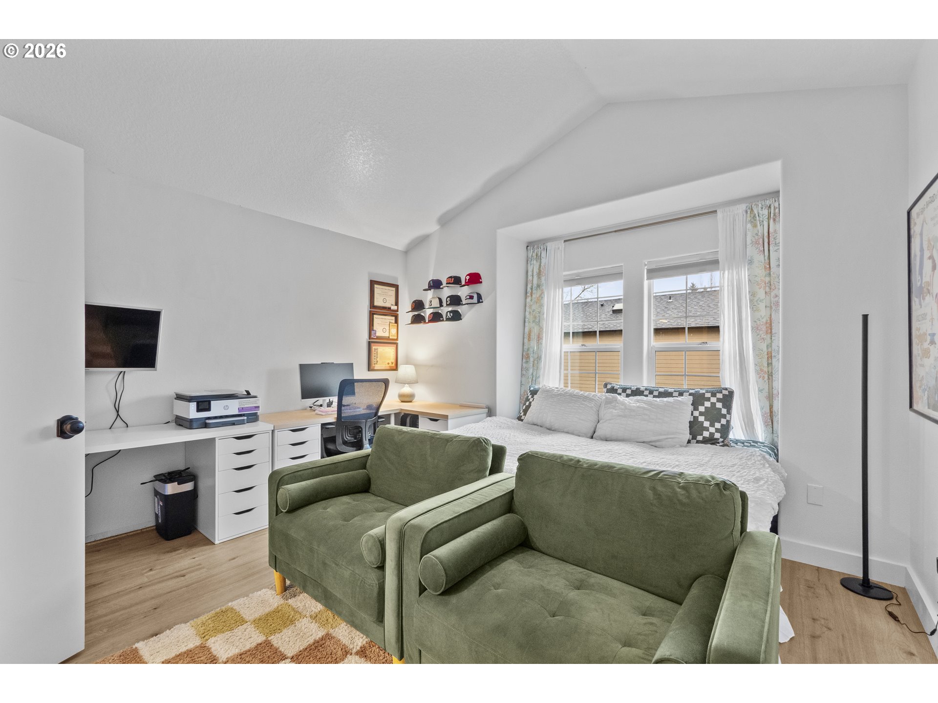 13949 Beavercreek Road, Unit 114 Oregon City, OR 97045 - Photo 13 of 27 a living room with furniture and a flat screen tv