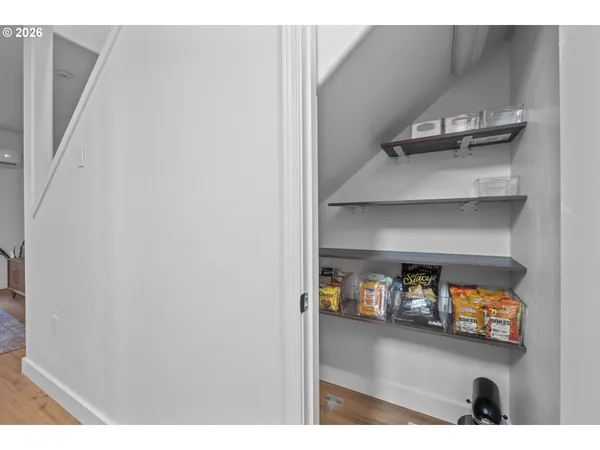 a view of a living room with furniture