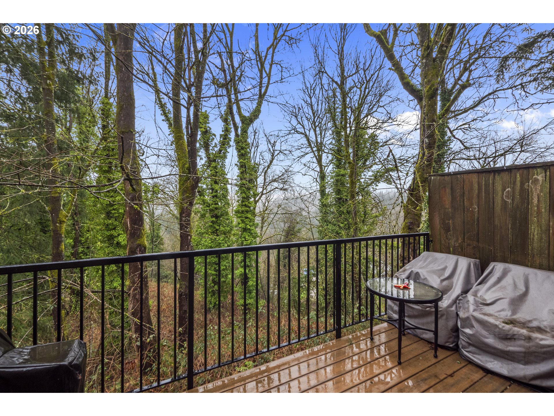 13949 Beavercreek Road, Unit 114 Oregon City, OR 97045 - Photo 18 of 27 a view of a chairs and table in backyard