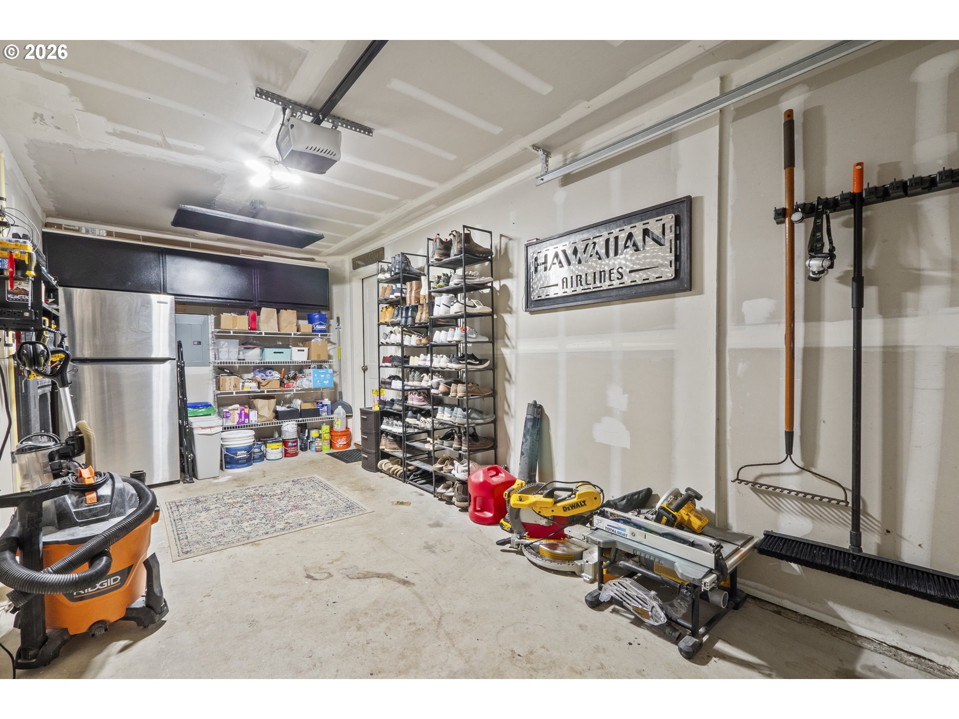 13949 Beavercreek Road, Unit 114 Oregon City, OR 97045 - Photo 22 of 27 a room with gym equipment and a view of living room