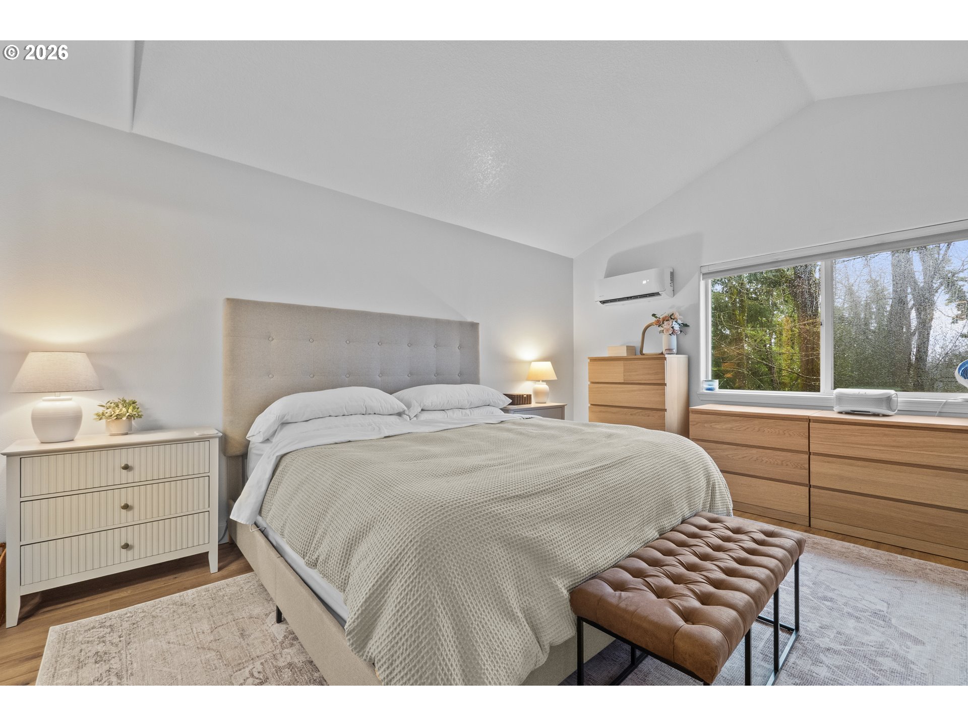 13949 Beavercreek Road, Unit 114 Oregon City, OR 97045 - Photo 24 of 27 a bedroom with a bed and a chair