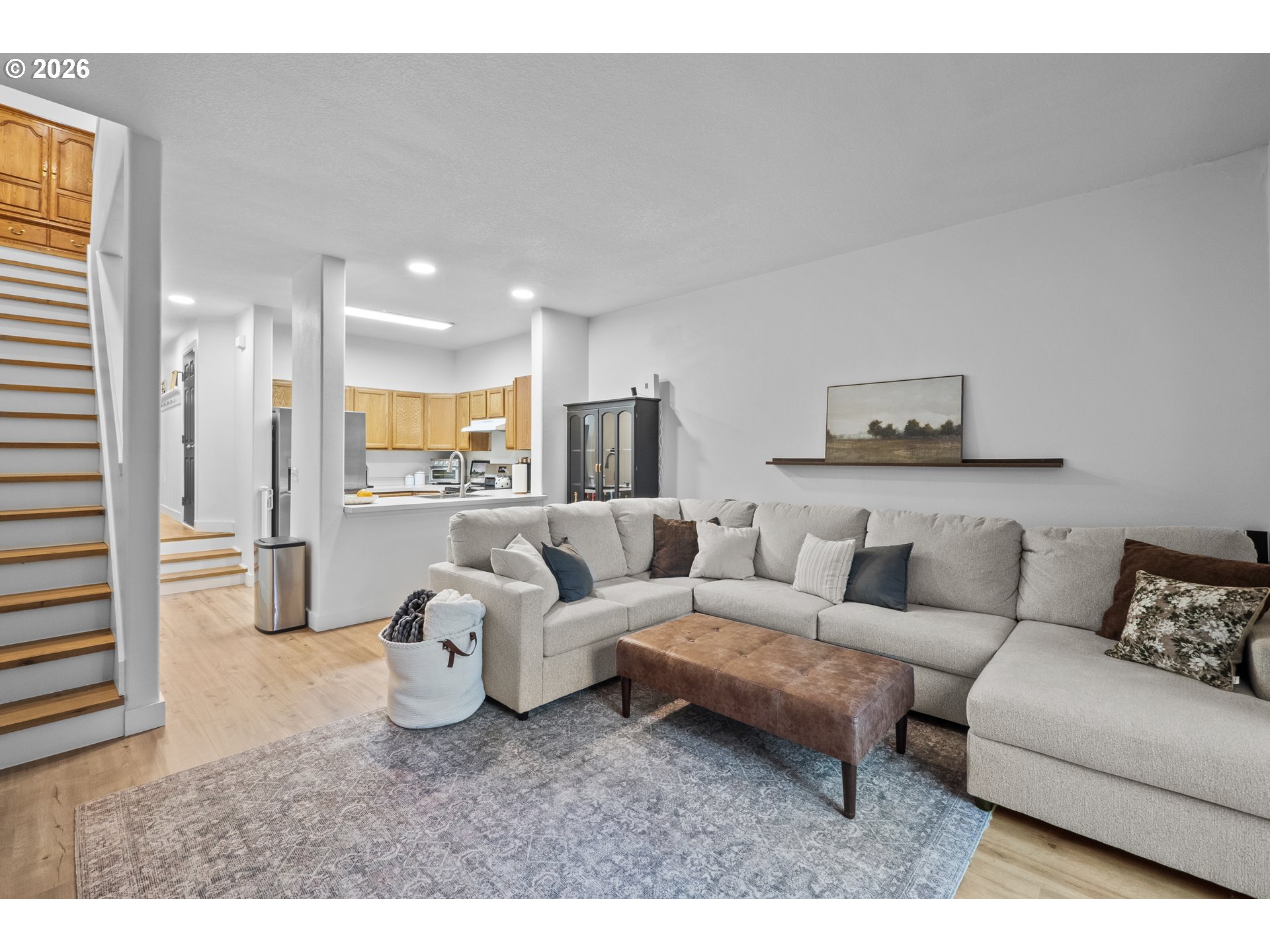 13949 Beavercreek Road, Unit 114 Oregon City, OR 97045 - Photo 8 of 27 a living room with furniture and a large window