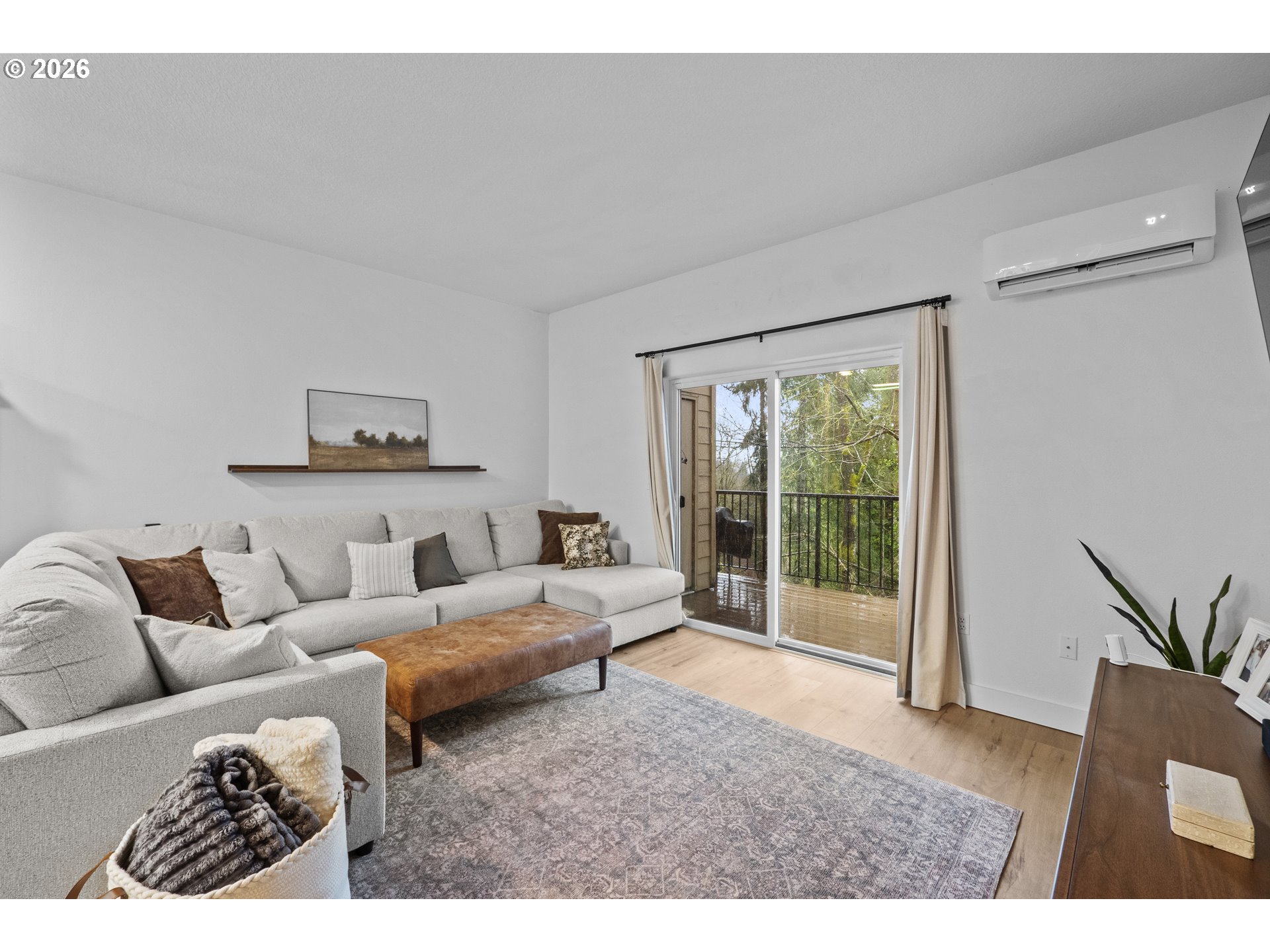 13949 Beavercreek Road, Unit 114 Oregon City, OR 97045 - Photo 10 of 27 a living room with furniture and a large window