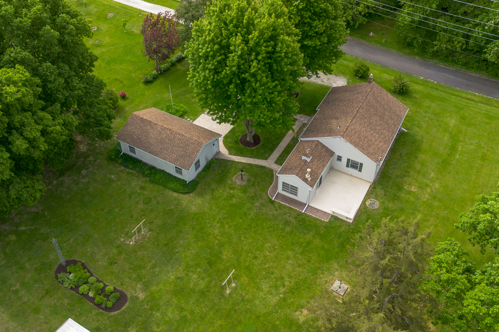 698 North 2853rd Road LaSalle, IL 61301 - Photo 3 of 39 an aerial view of a house with a garden and trees