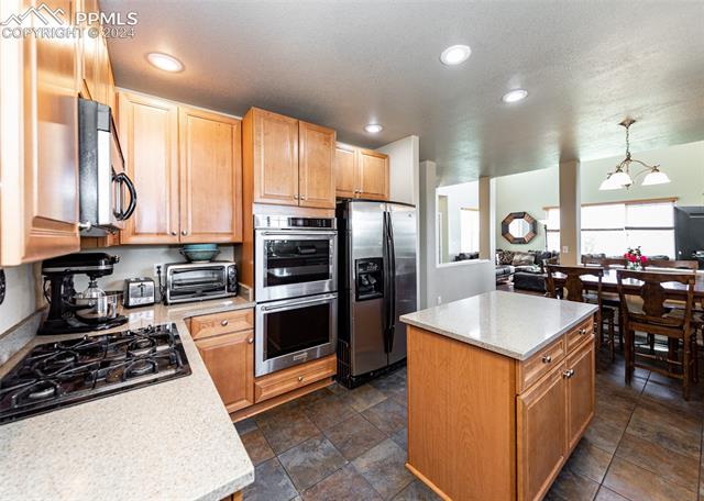 9445 Winged Foot Road Peyton, CO 80831 - Photo 12 of 44 Gallery Image 12