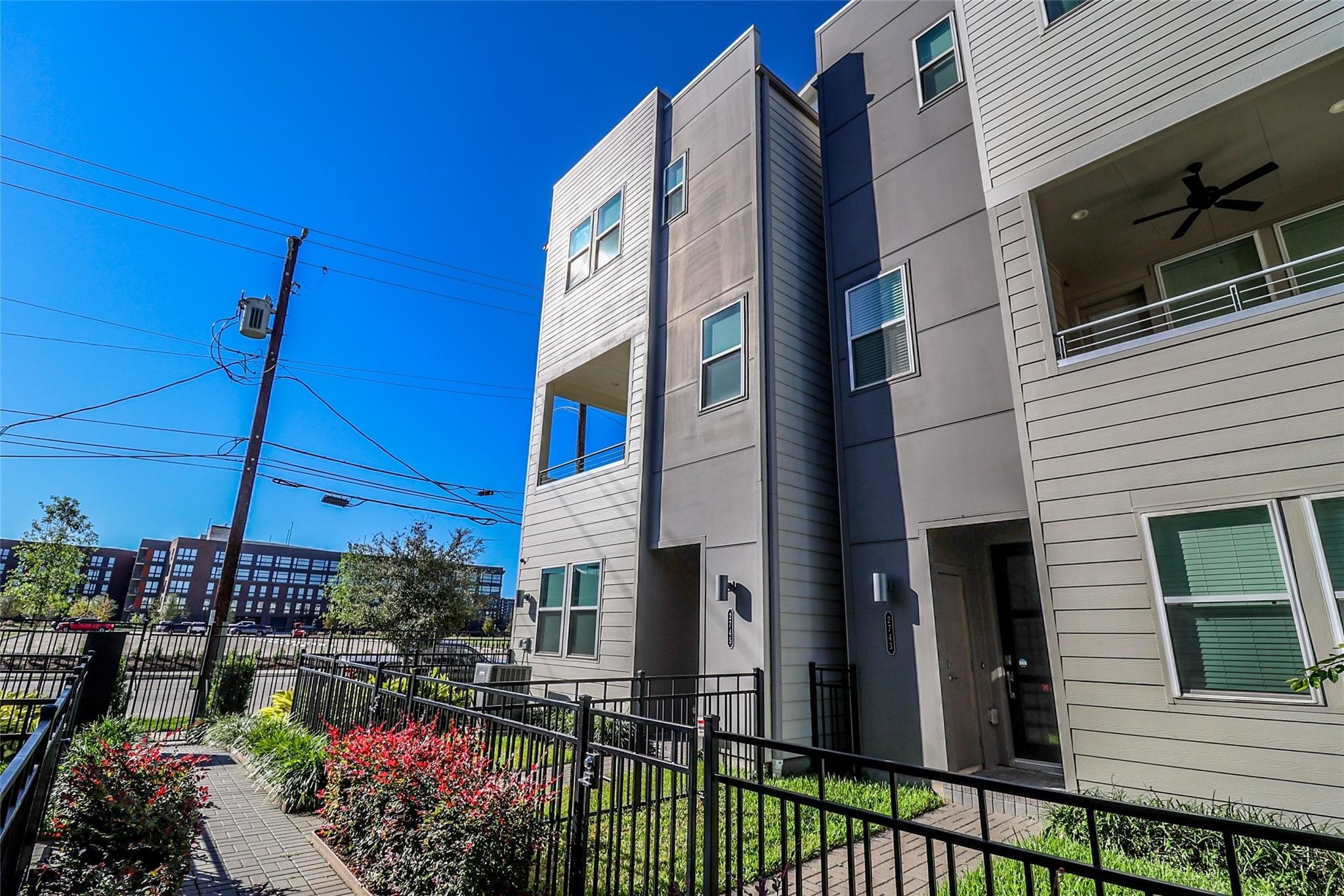 2745 Clinton Drive Houston, TX 77020 - Photo 1 of 32 a view of a house with a yard and potted plants