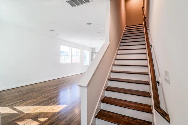 a view of entryway with wooden floor