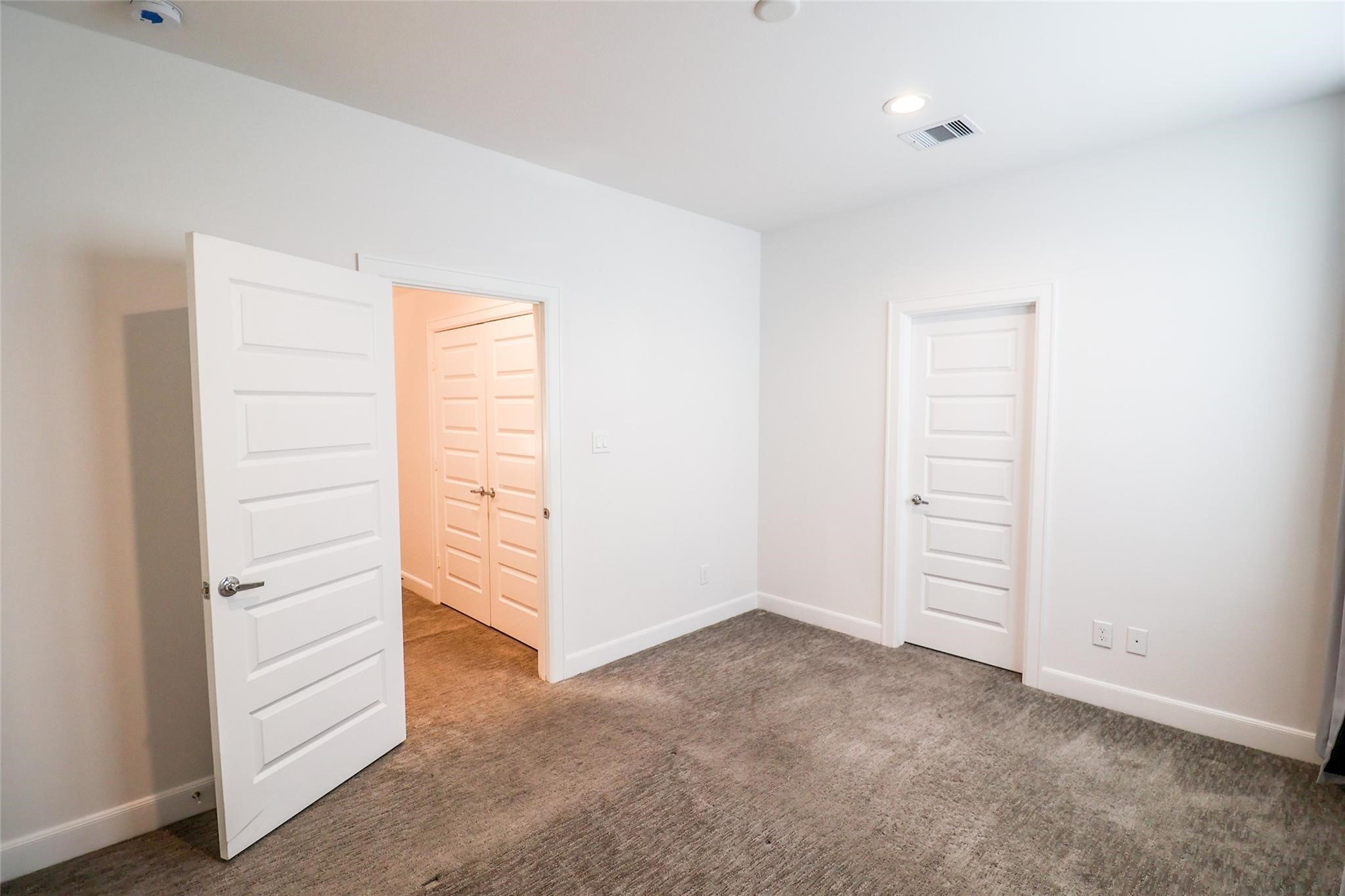 2745 Clinton Drive Houston, TX 77020 - Photo 13 of 32 a view of an empty walk in closet