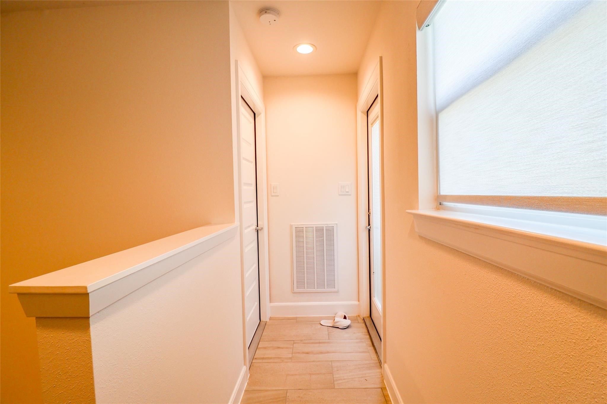 2745 Clinton Drive Houston, TX 77020 - Photo 26 of 32 a view of a glass door and a window