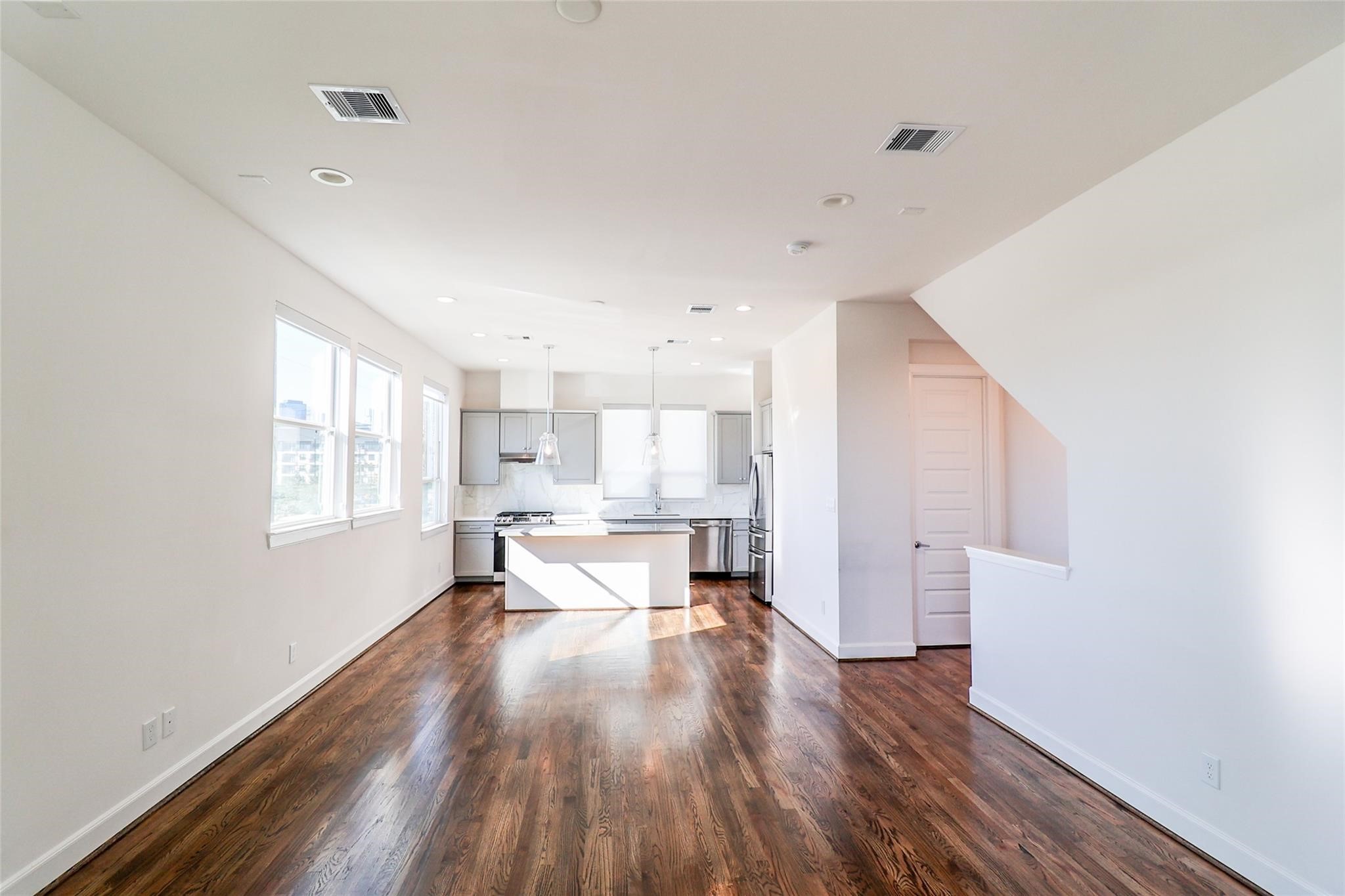 2745 Clinton Drive Houston, TX 77020 - Photo 5 of 32 a living room with furniture and a wooden floor