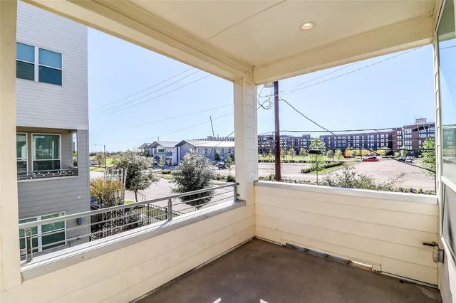 a view of a balcony and window