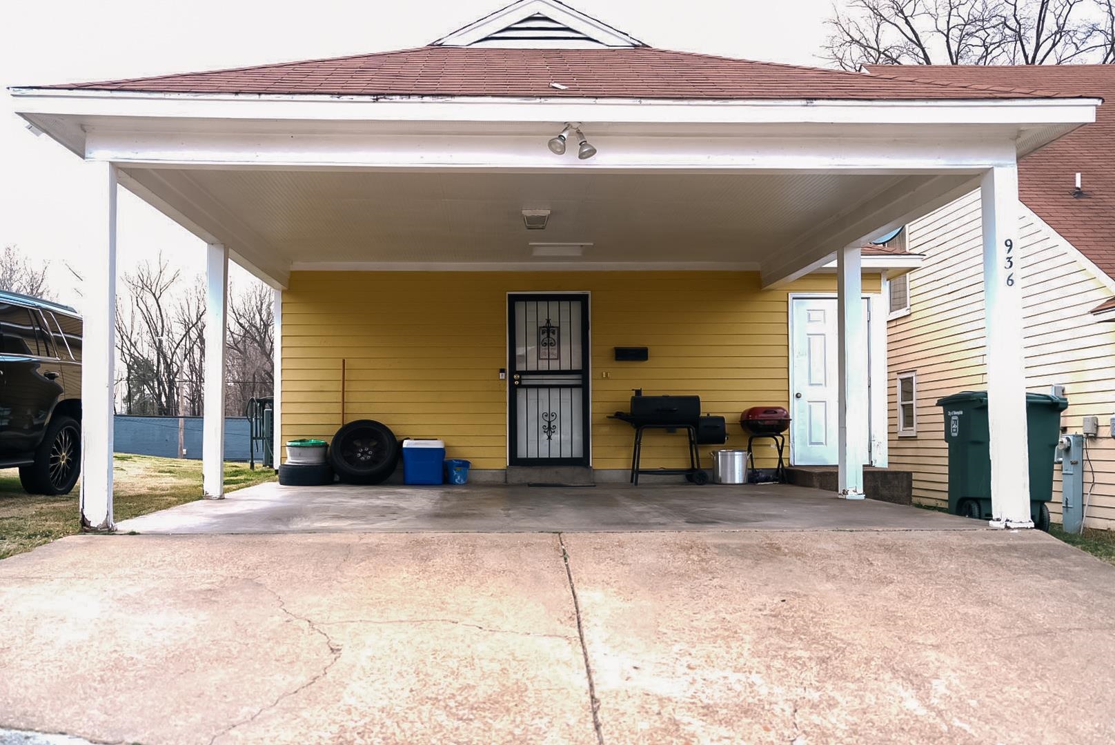 936 Porter Street Memphis, TN 38126 - Photo 22 of 22 View of parking featuring concrete driveway and a carport