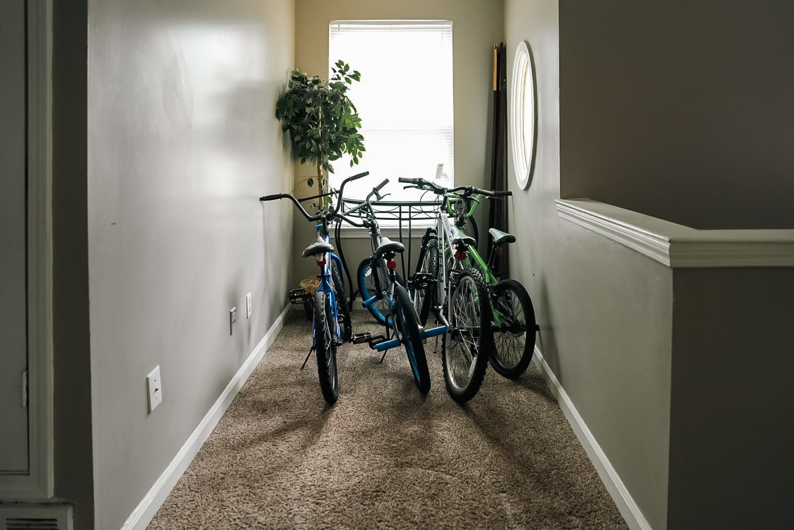 936 Porter Street Memphis, TN 38126 - Photo 9 of 22 Hallway with baseboards and dark colored carpet