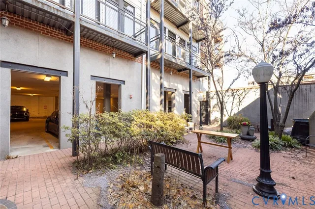 a view of a house with a bench in balcony