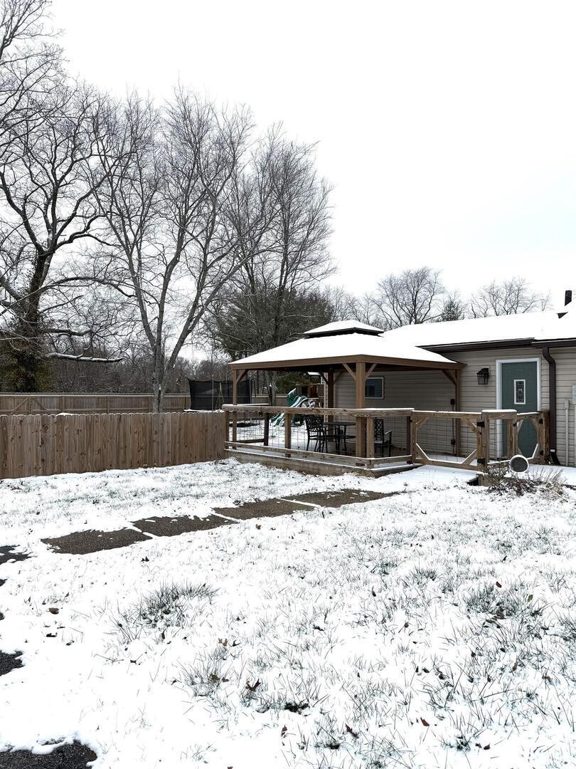 2407 Selmaville Road Salem, IL 62881 - Photo 18 of 19 a view of a yard covered with snow in front of house