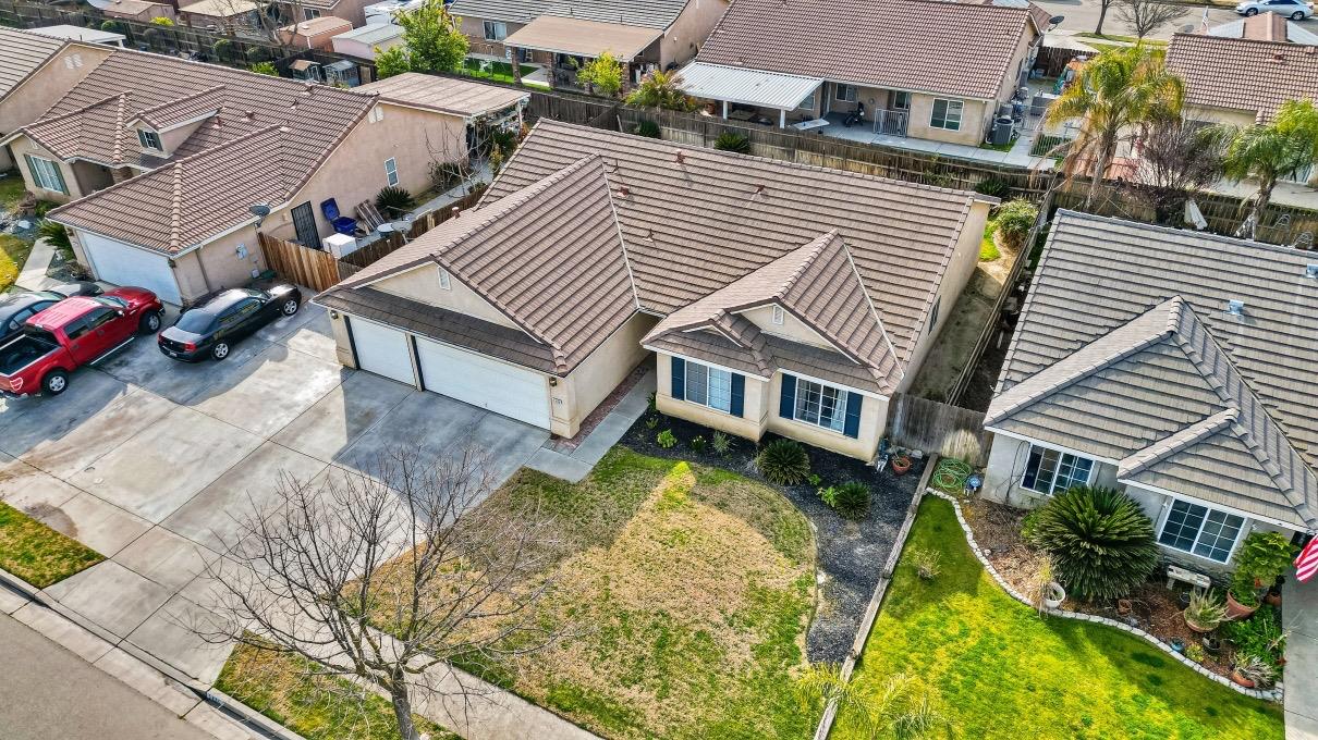 1435 Summerwind Drive Lemoore, CA 93245 - Photo 29 of 32 an aerial view of a house with swimming pool