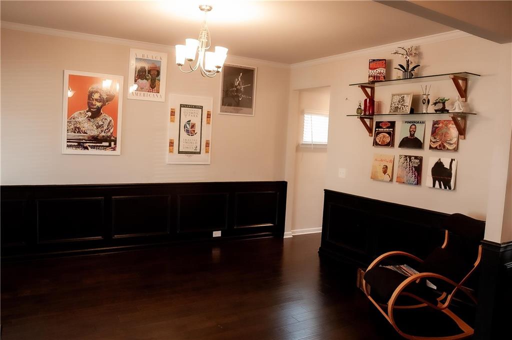 3605 Broadwick Lane Stonecrest, GA 30038 - Photo 4 of 18 a view of a workspace with furniture and wooden floor
