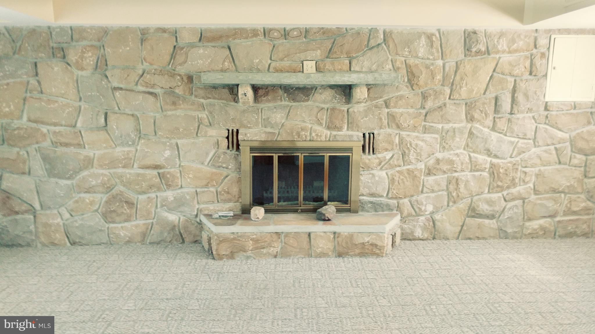 1229 Braddock Road Lavale, MD 21502 - Photo 11 of 19 Family room woodburning fireplace.