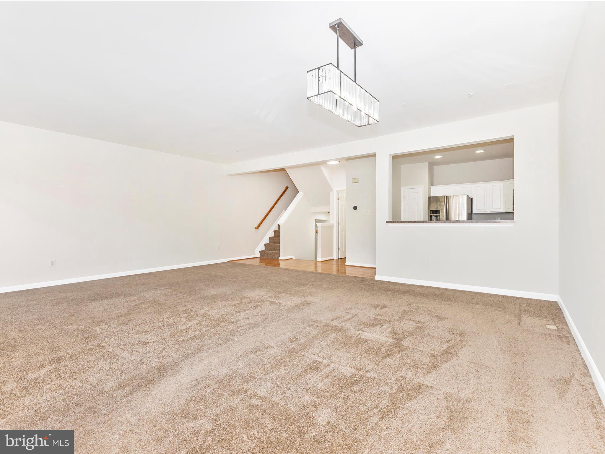 7096 Water Oak Road, Unit 121 Elkridge, MD 21075 - Photo 14 of 46 a view of a room with an empty space
